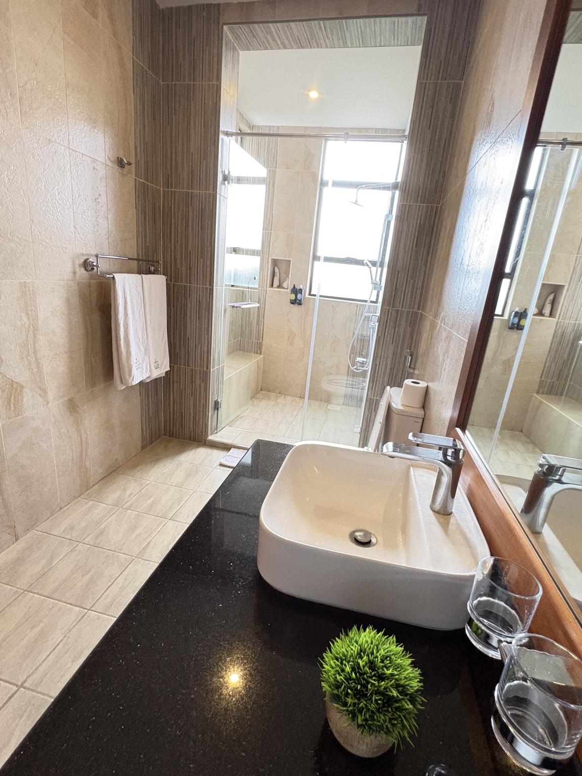 Villa 54 Deluxe Bathroom with vanity and walk-in shower