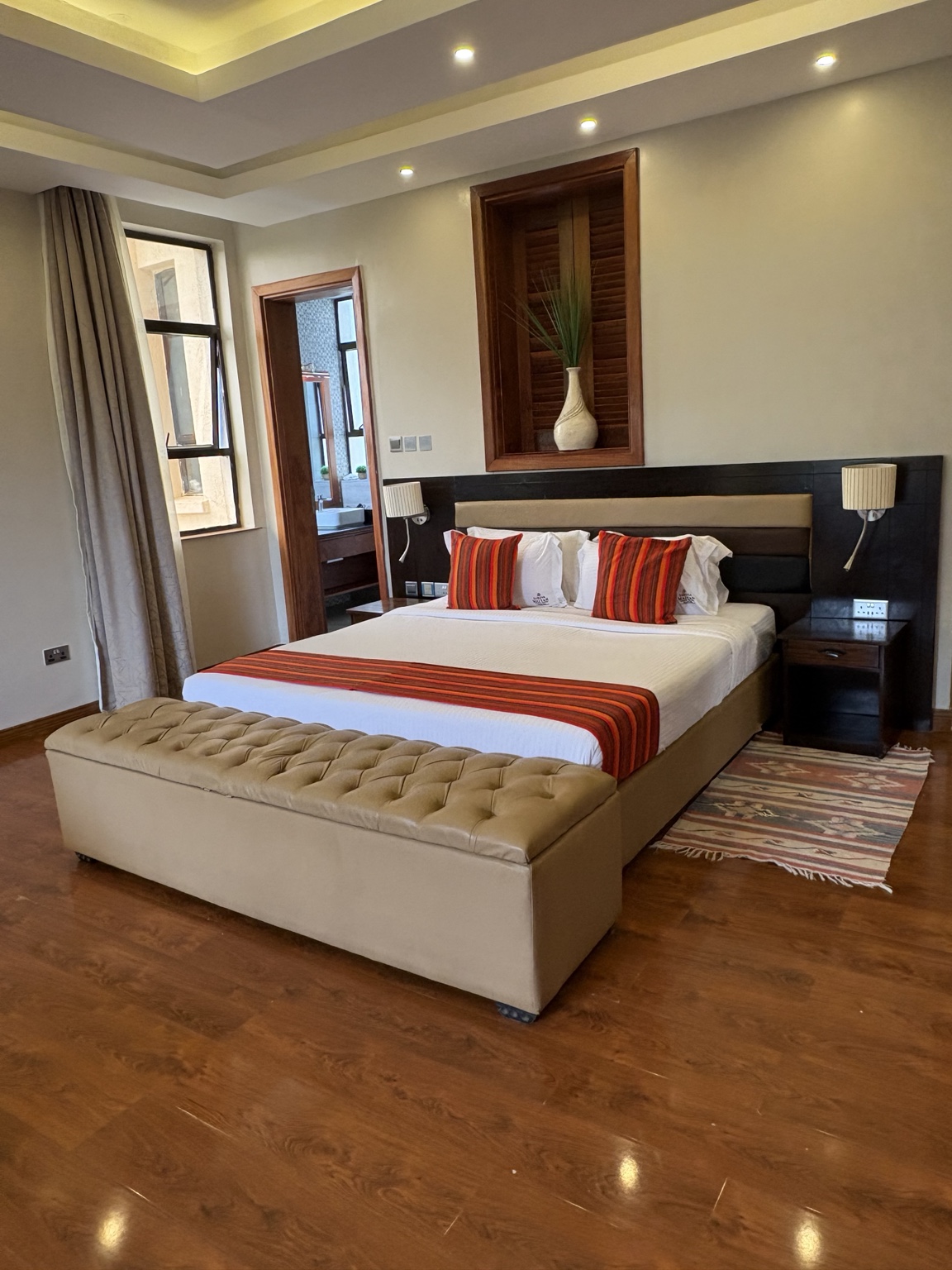 Villa 54 Executive Room bedroom and living area